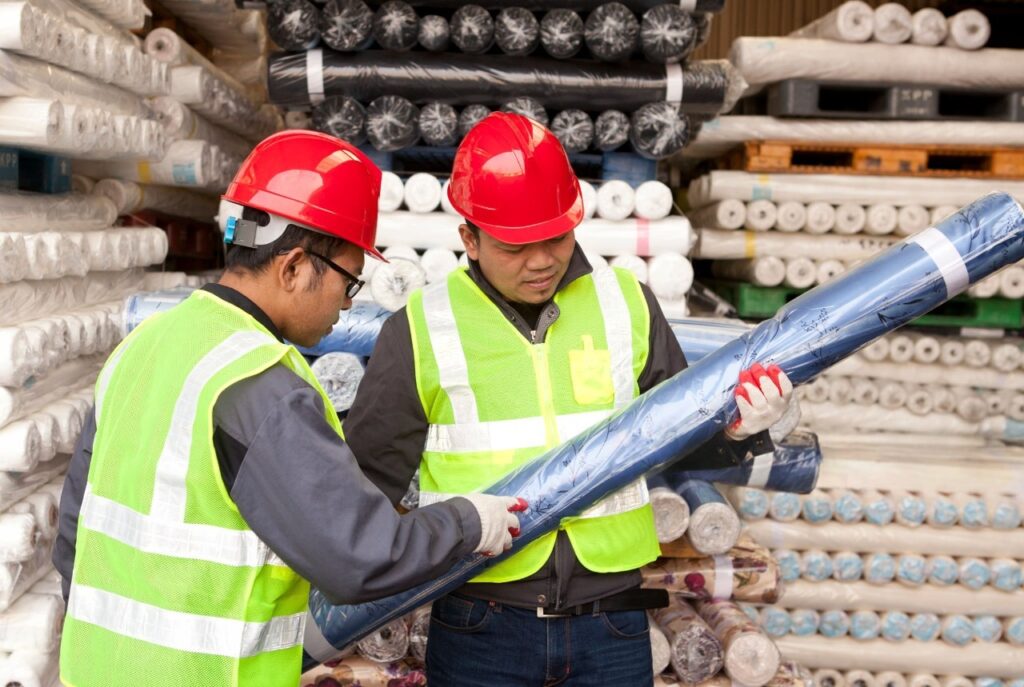 Engineers talking in factory